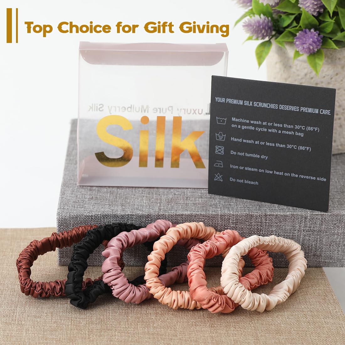 Night routine with LOVUITEN silk scrunchie resting softly on pillow.