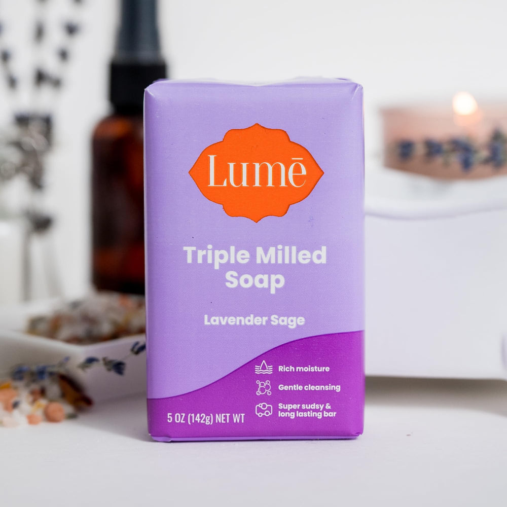 Lume bar soap for shaving use shown in bathroom setting.