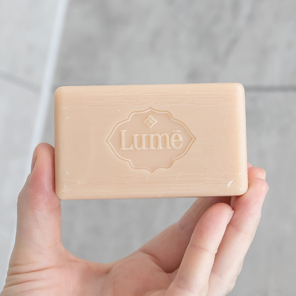 Lume Triple Milled Bar Soap highlighting skin-loving, toxin-free ingredients.