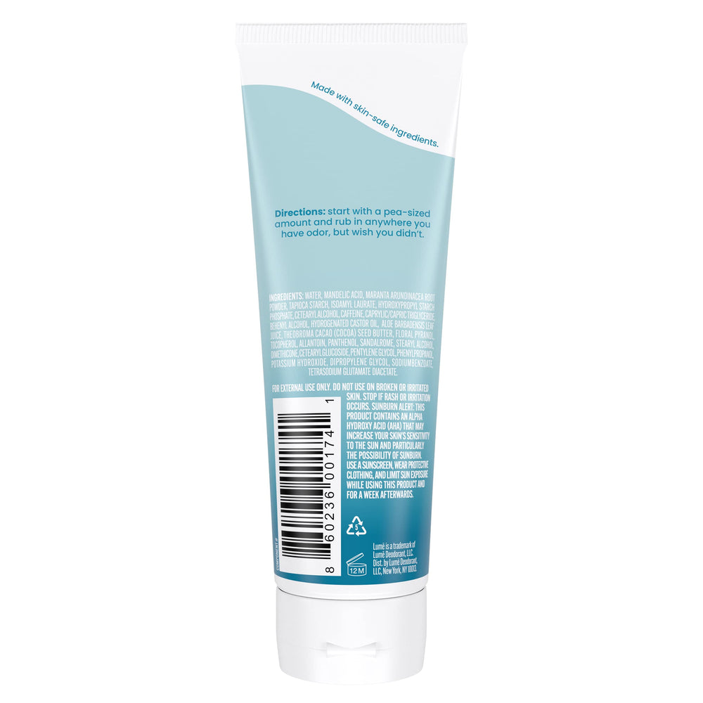 Lume invisible cream tube texture close-up highlights smooth rub-in formula for gentle odor protection