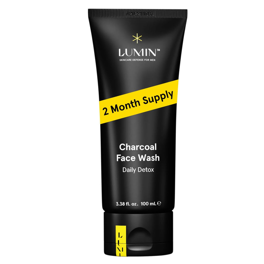 Lumin Charcoal Face Wash bottle closeup showcasing detox cleansing for men.