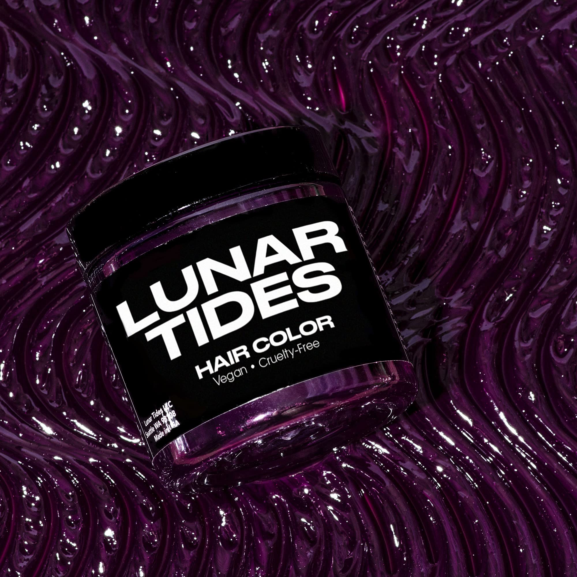 Lunar Tides Plum Purple during application with gloves for salon-ready color at home.