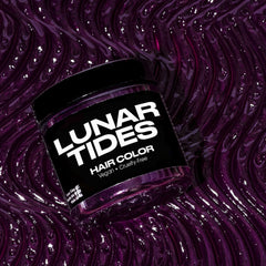 Lunar Tides Plum Purple during application with gloves for salon-ready color at home.