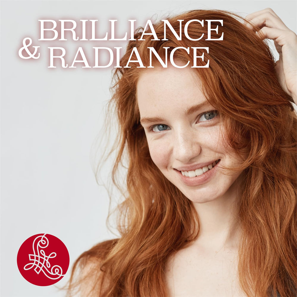 Luseta conditioner application showing creamy texture and detangling ease