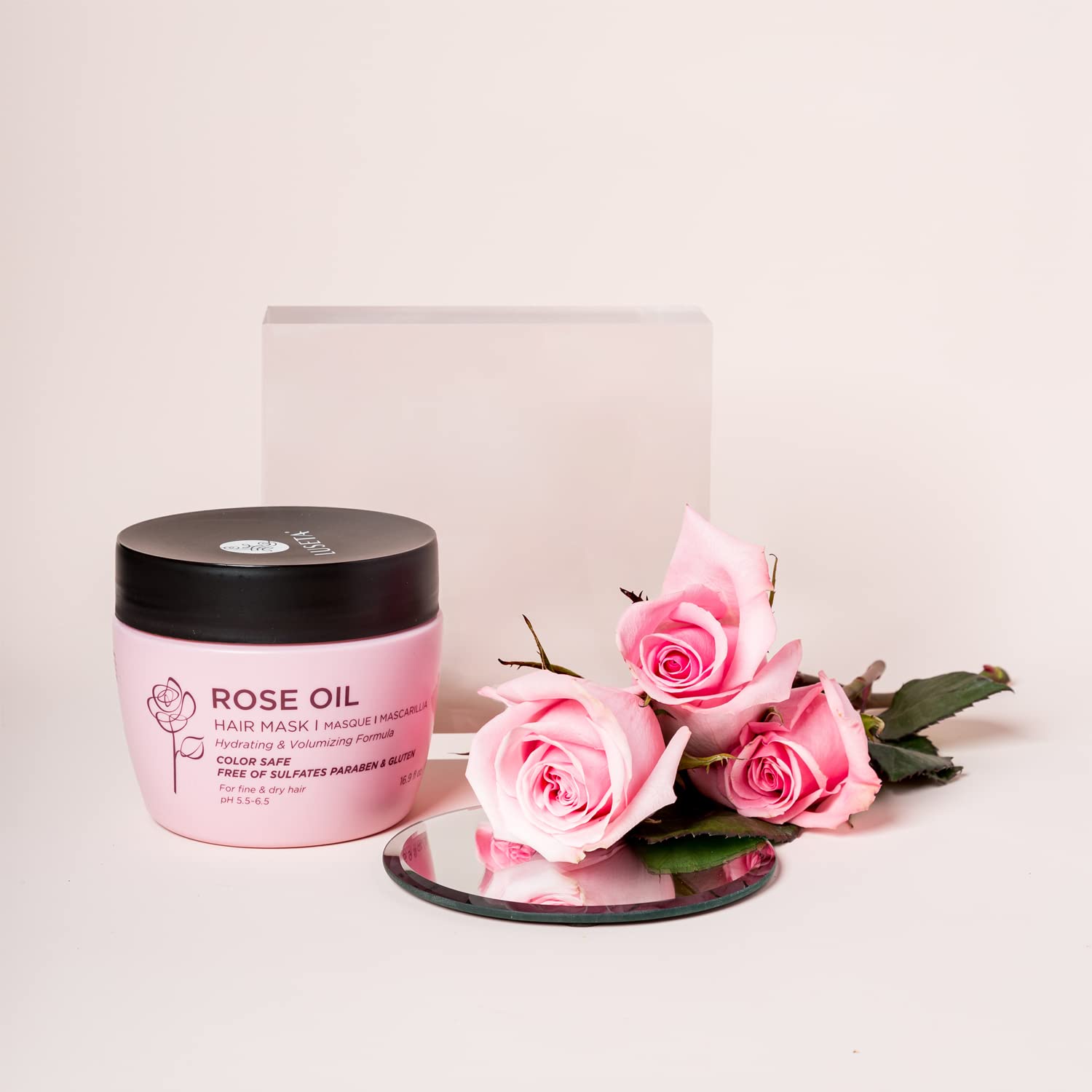 Luseta rose oil hair mask packaging closeup showcases natural ingredients for smooth, shiny hair