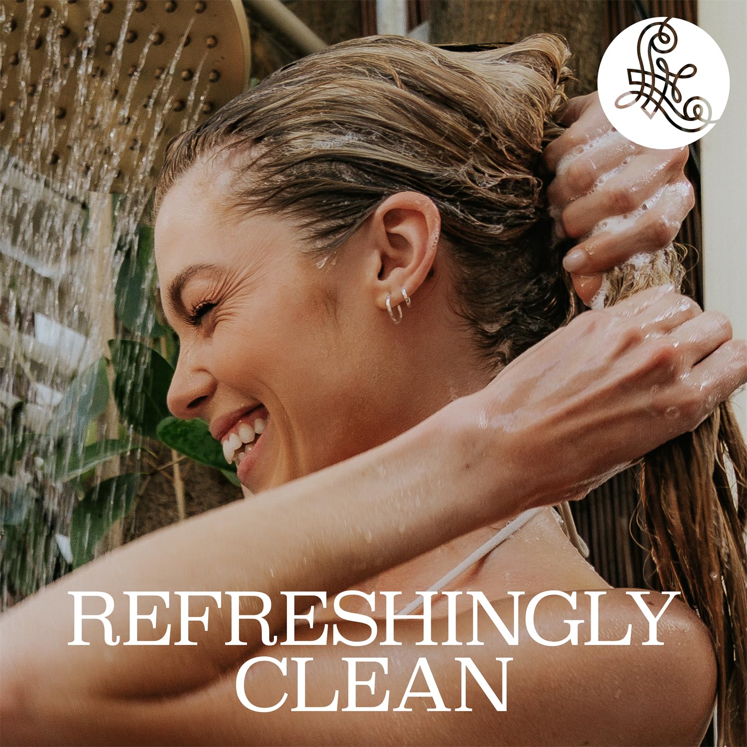 Luseta Tea Tree Shampoo damaged-hair care shot suggests repair-friendly formula.