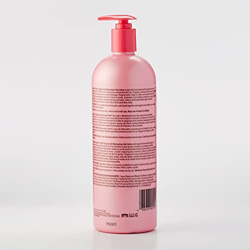 Luster's Pink Oil Moisturizer close-up—shine boost and easy detangling for soft hair.