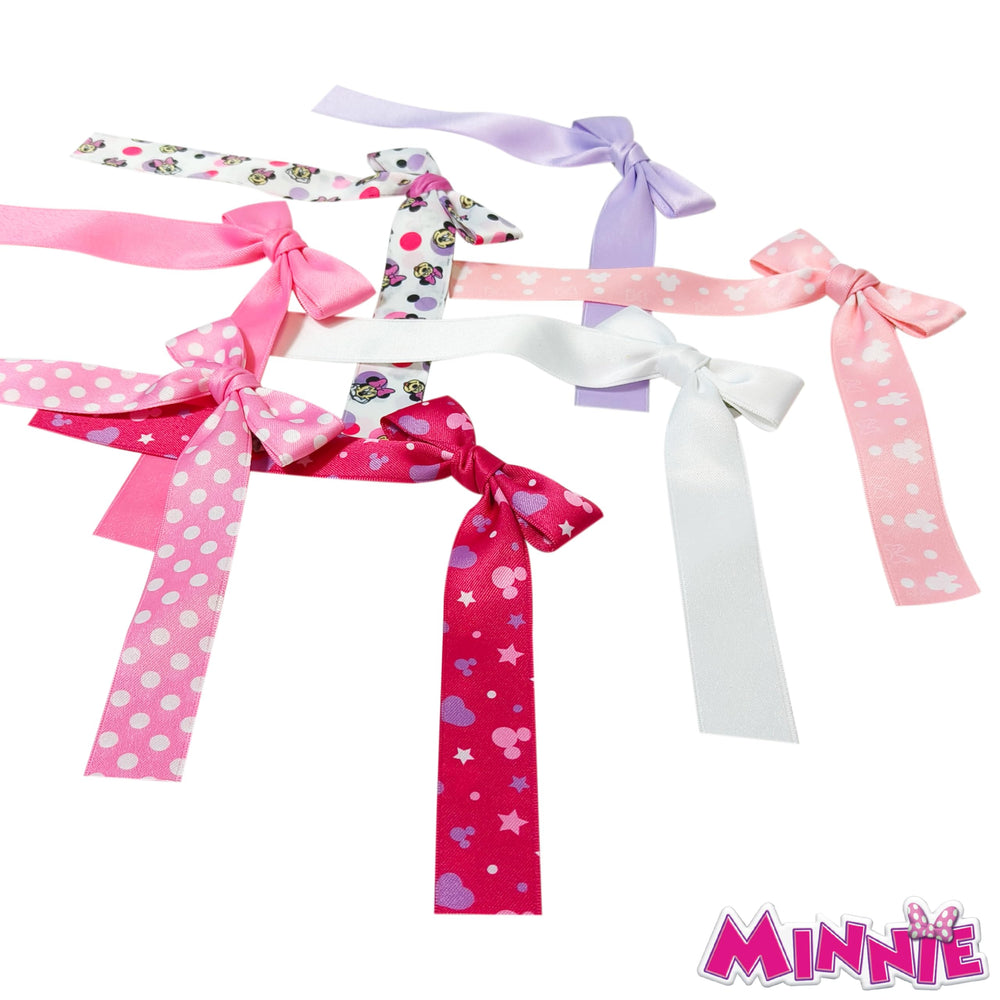 LUV HER Minnie long tail bows worn by child demonstrating easy clip-on use
