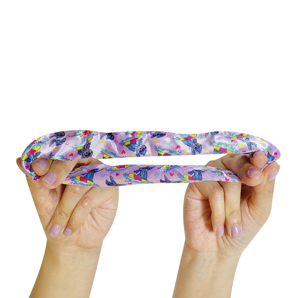 LUV HER Stitch hairbrush handle design promoting comfortable grip.