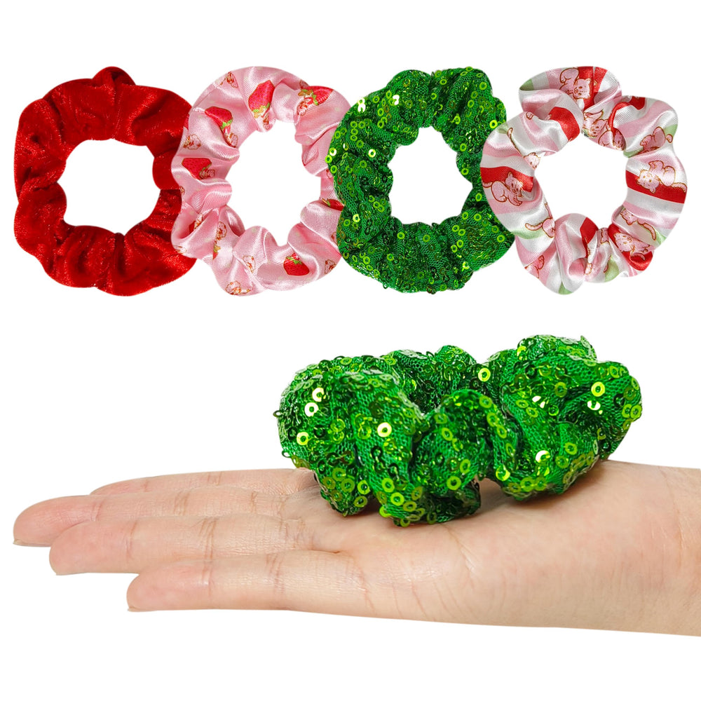 LUV HER Strawberry Shortcake scrunchies piled for colorful styling options.