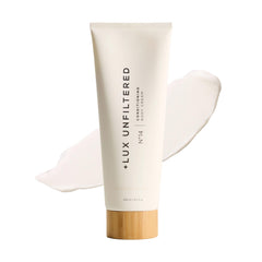Lux Unfiltered N°14 conditioning body cream bottle provides daily hydration.