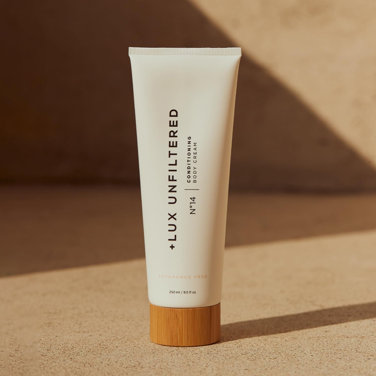 Lux Unfiltered N°14 ingredients graphics highlight hydrating jojoba, squalane, and hyaluronic acid.