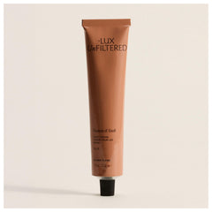 Lux Unfiltered N°24 fountain-of-youth bottle pour demonstrates rich hydration