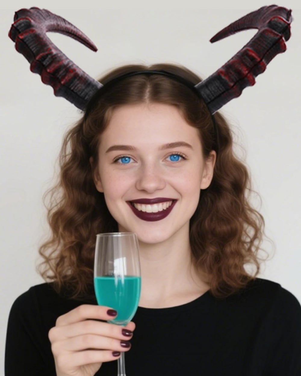 L'VOW Maleficent Horns Headband shows dramatic silhouette for cosplay ensembles.