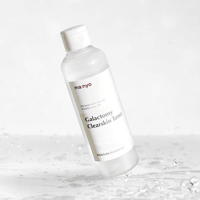 ma:nyo Galactomy Clear Skin Toner on cotton pad for gentle exfoliation