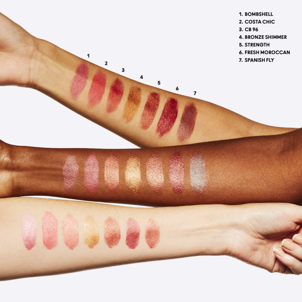 MAC Frost Lipstick Bronze Shimmer on lips in daylight offers bronze glow and shine.