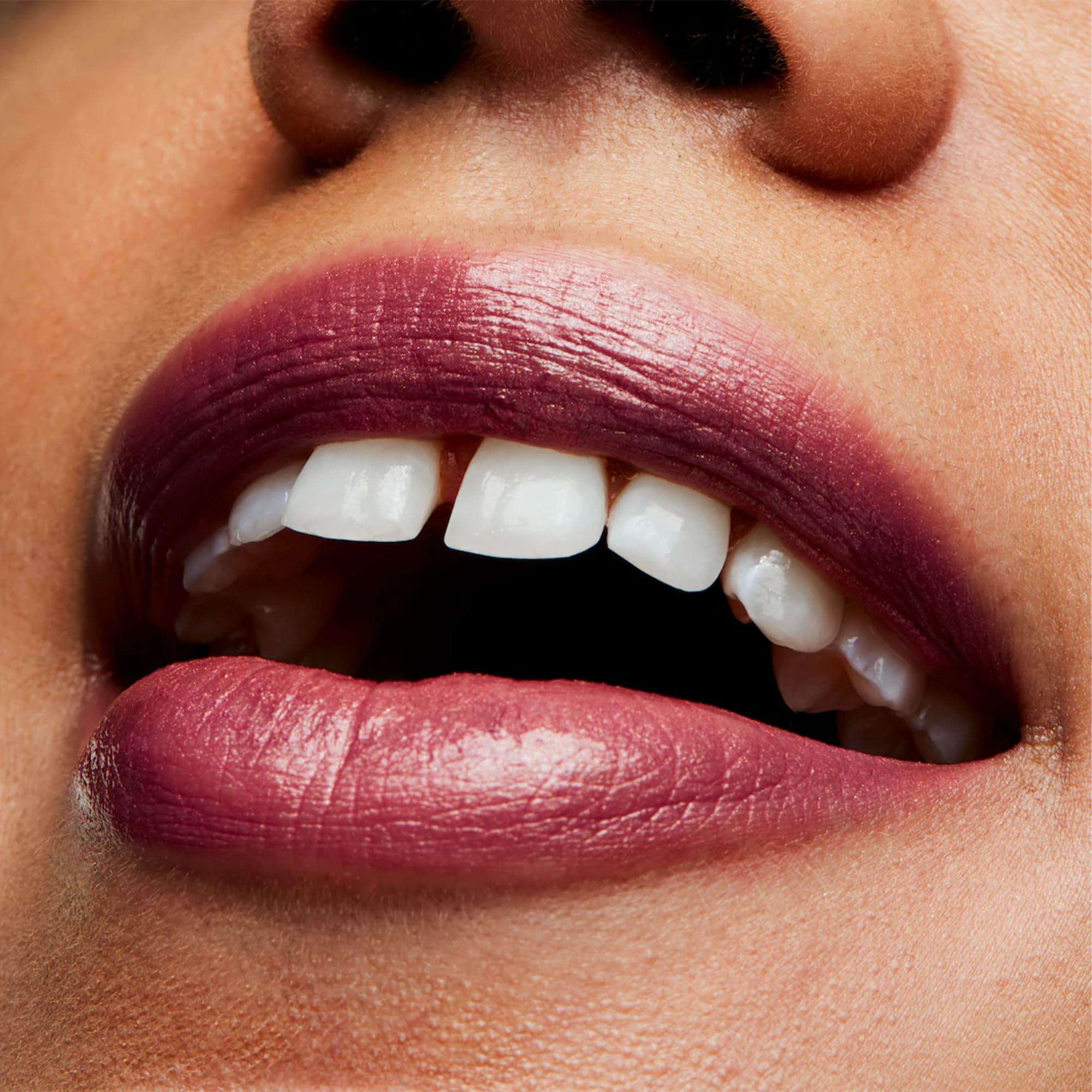 MAC Frost Lipstick Plum Dandy on lips showing semi-lustrous finish.