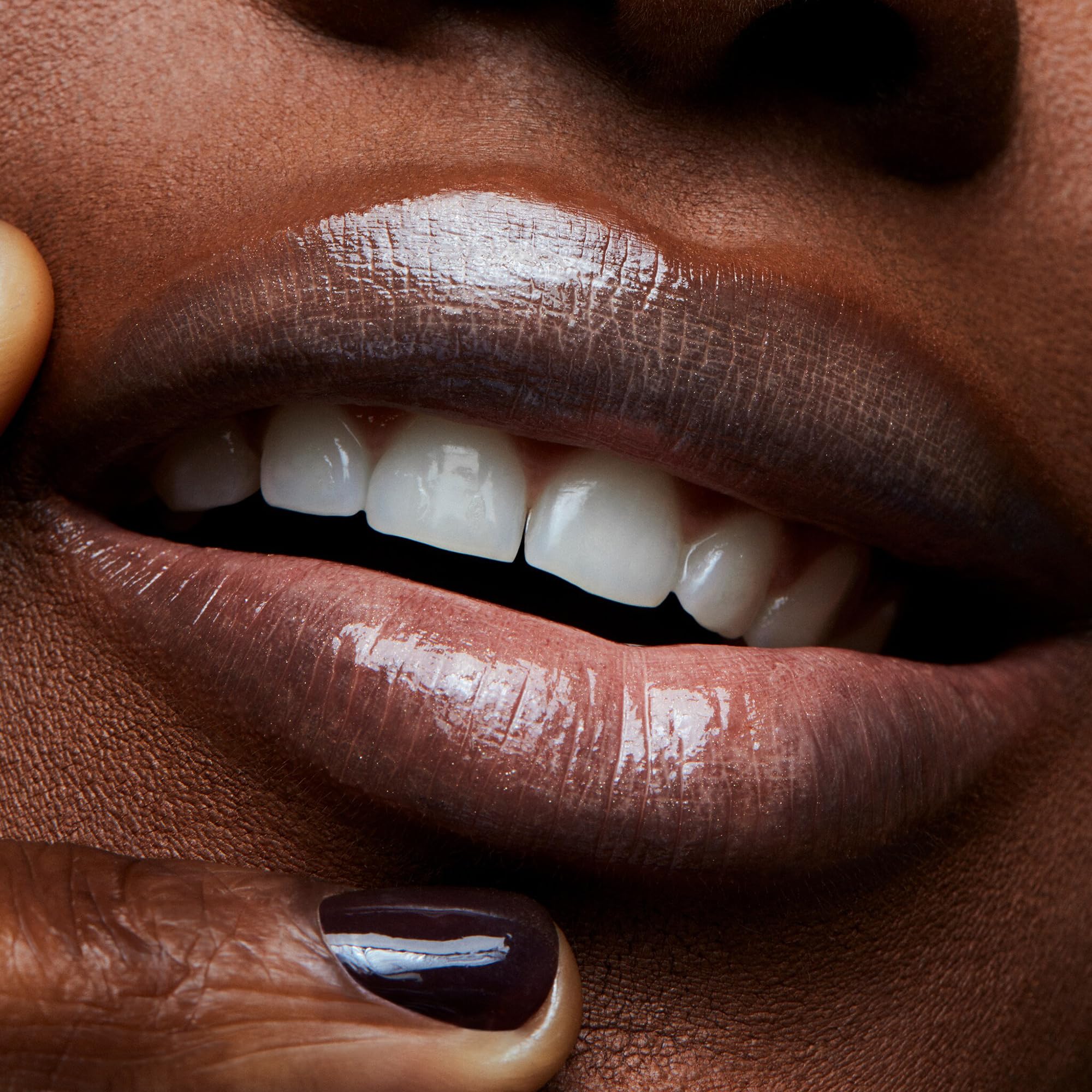 MAC Lipglass C-Thru layering over lip pencils creates a glass-like finish.