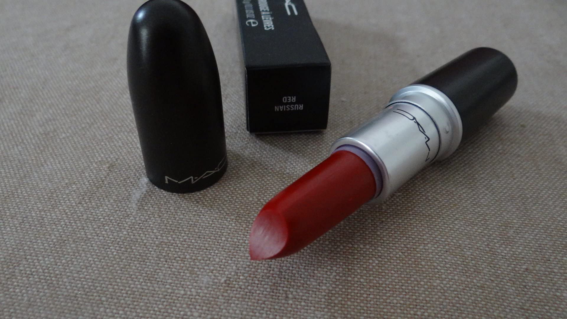MAC Matte Lipstick 612 Russian Red no-shine-finish closeup shows modern matte elegance