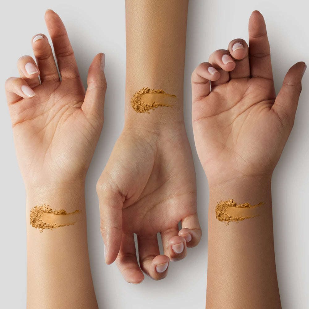 MAC Studio Fix Powder Foundation application brush demonstrating buildable coverage and oil control
