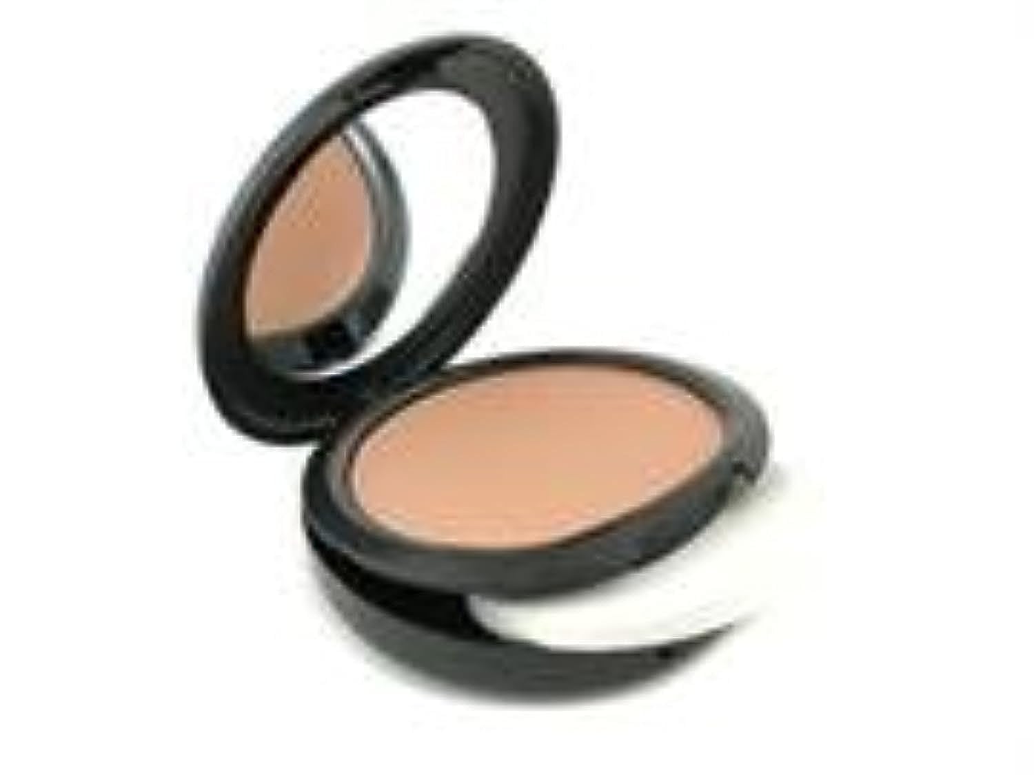 MAC Studio Fix compact close-up showing natural coverage and smooth finish