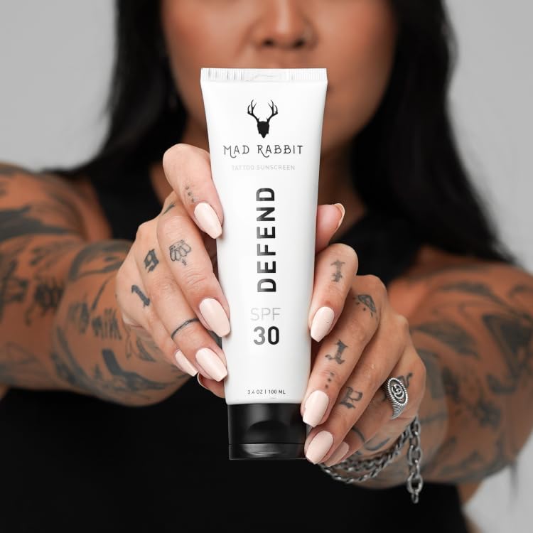 Mad Rabbit Defend sunscreen application on face and arm shows everyday protection.