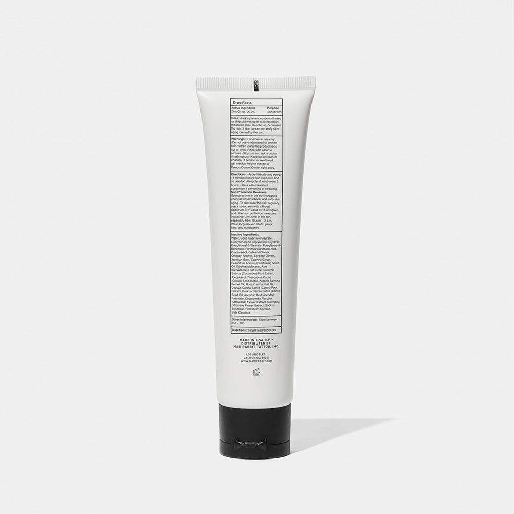 Mad Rabbit Defend sunscreen outdoor scene emphasizes sun protection for active days.