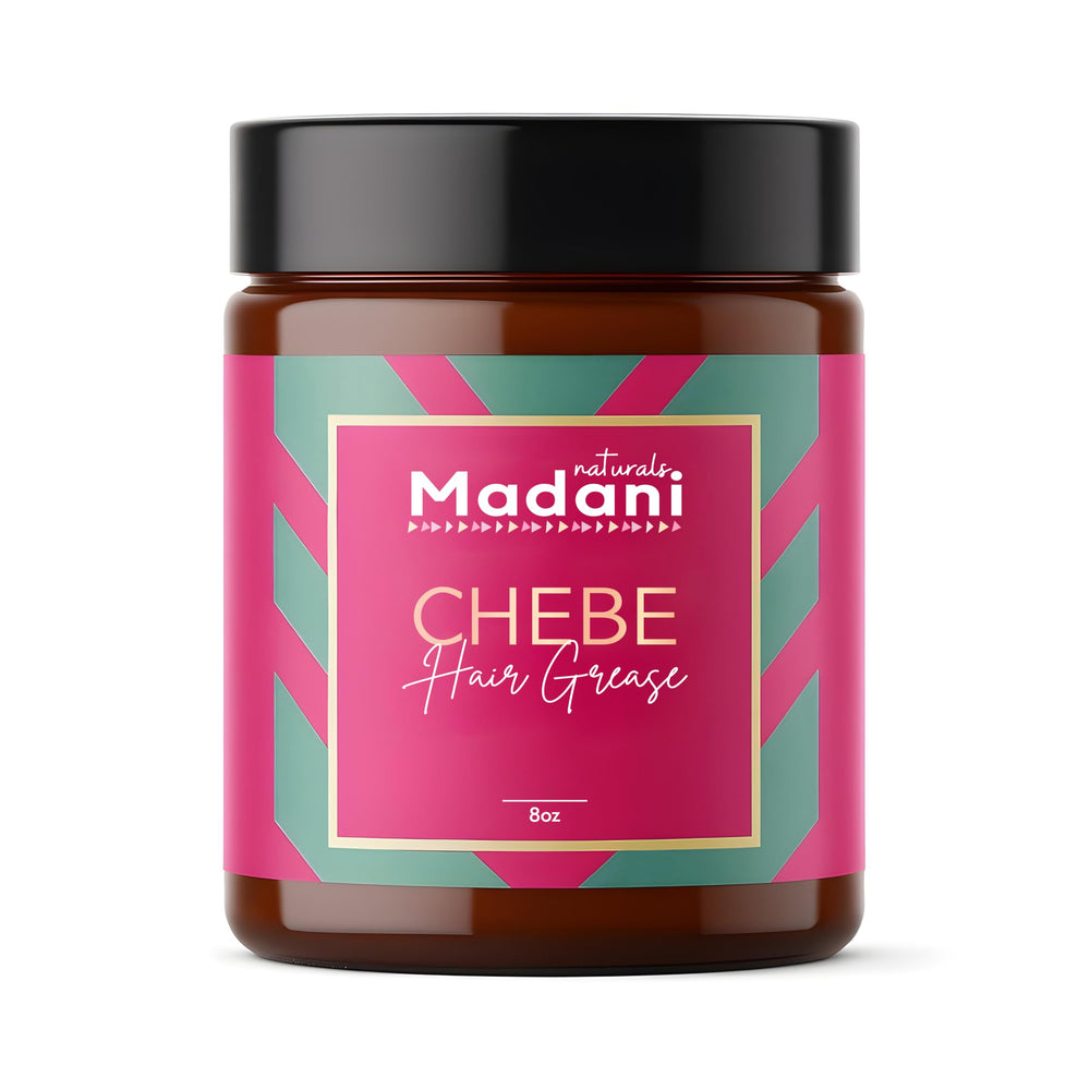 Madani Naturals Chebe Hair Grease bottle close-up shows premium formula for healthy hair.