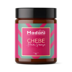 Madani Naturals Chebe Hair Grease bottle close-up shows premium formula for healthy hair.