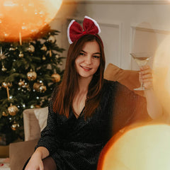 Madison Tyler headband shows white fluffy trim detail for soft holiday styling.