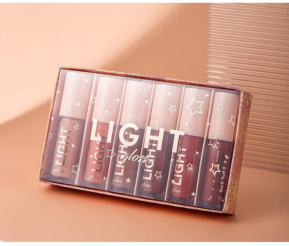 MAEPEOR lipgloss set shown with makeup bag for travel.