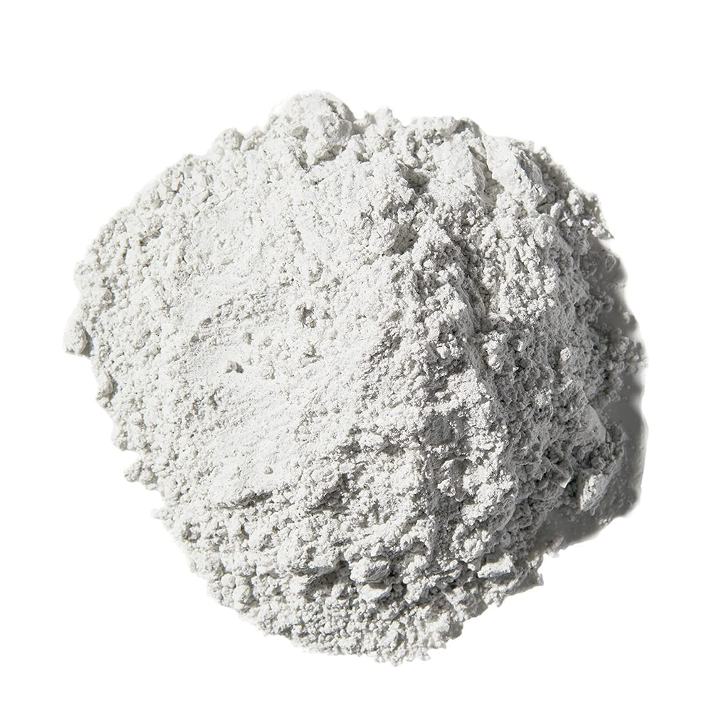Magic Skin Conditioning Shaving Powder tin closeup highlights silky texture for a smooth shave.