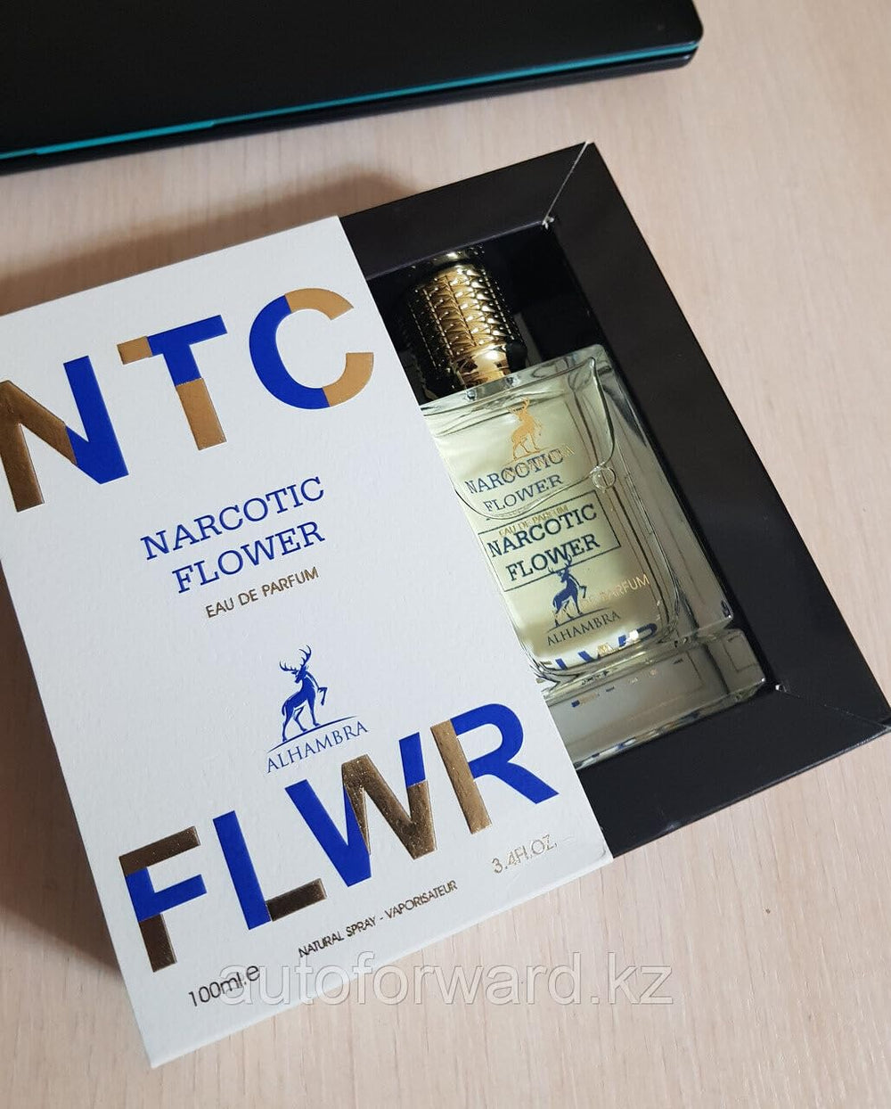 Maison Alhambra Narcotic FLWR bottle spraying in hand, ideal for evening wear and mood