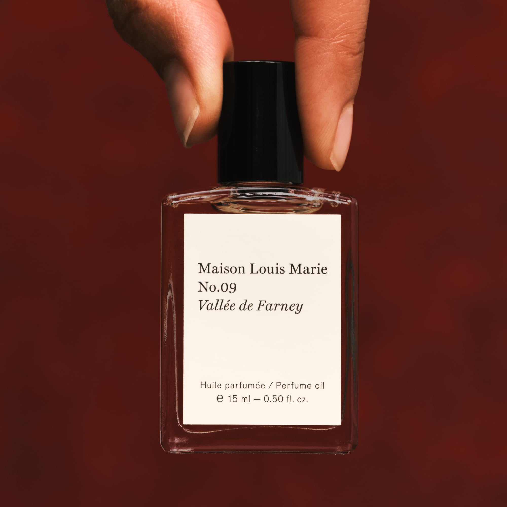 Maison Louis Marie No.09 amber-toned oil with inviting aroma.