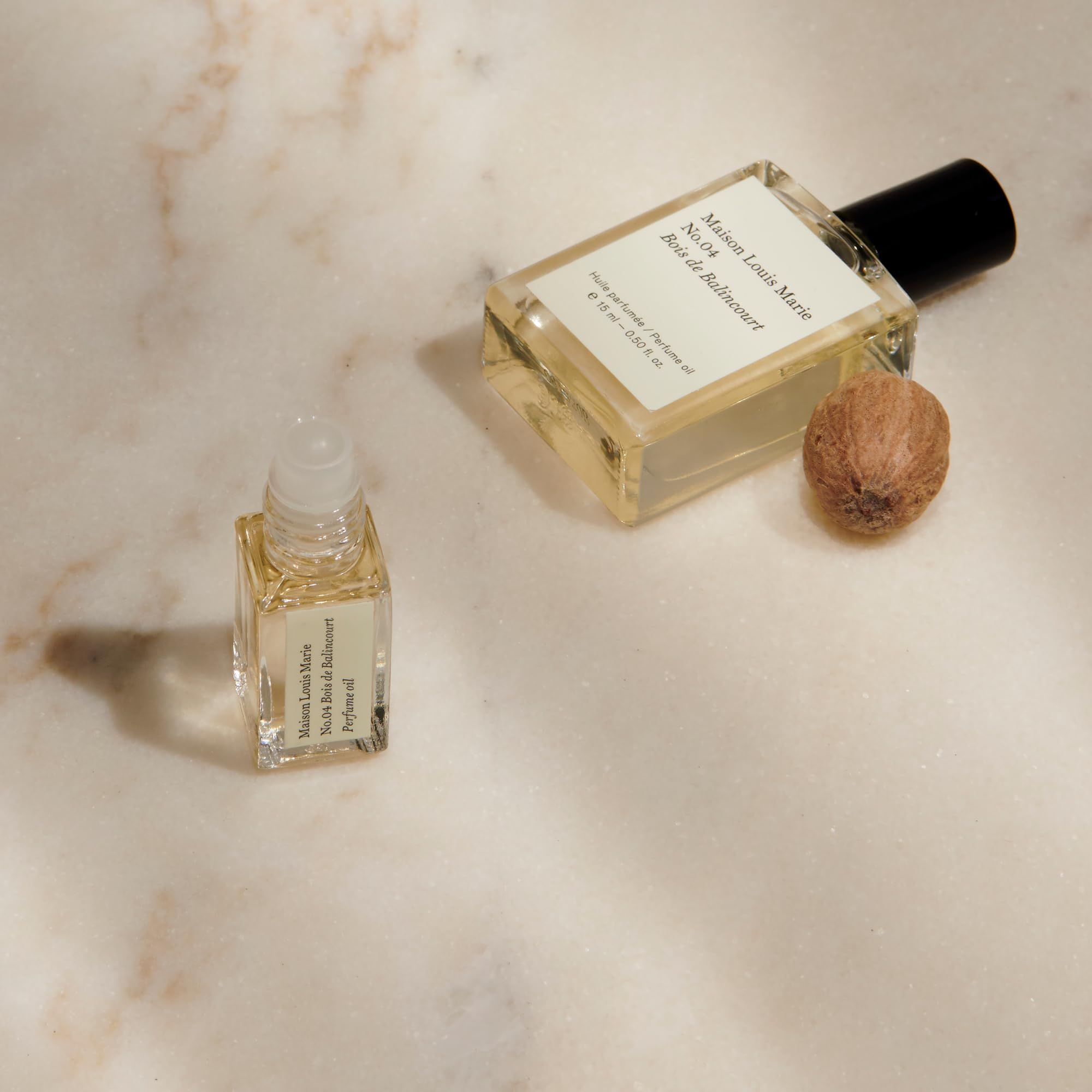 Maison Louis Marie No.04 notes highlight sandalwood, vetiver, amber woods
