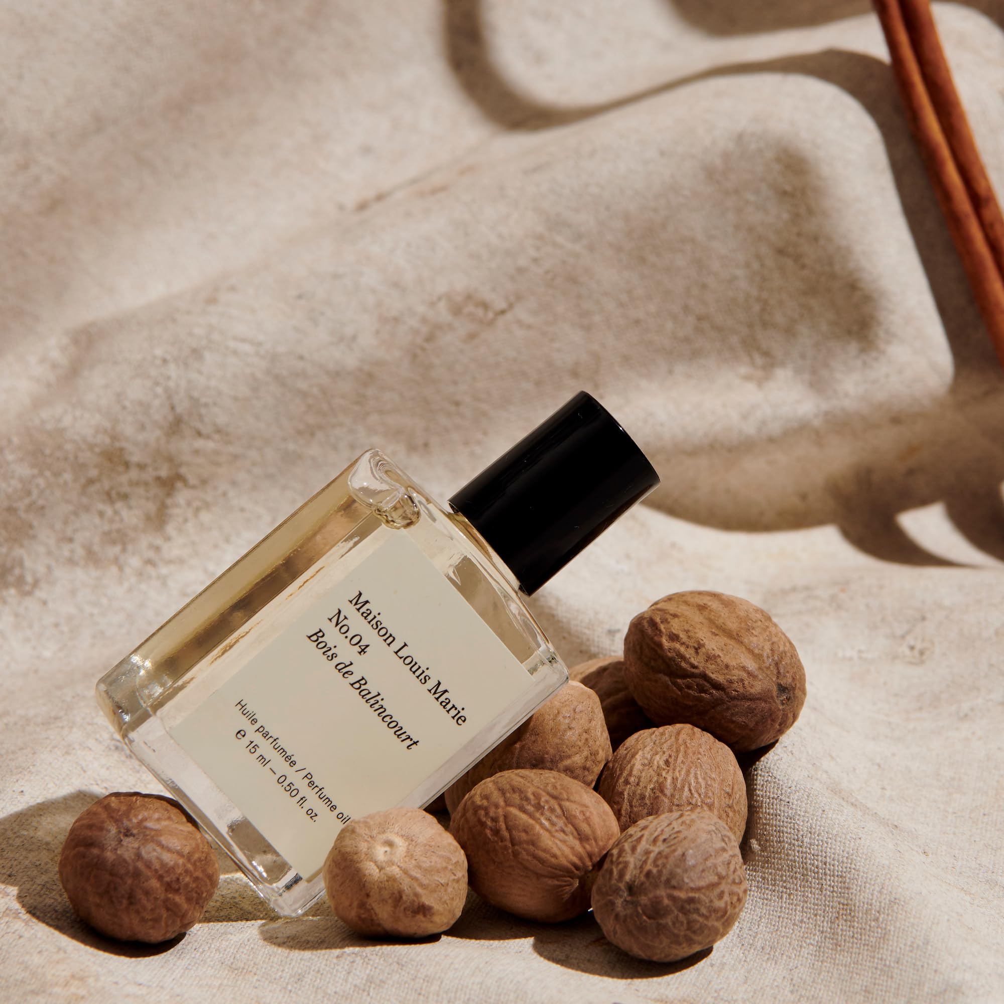 Maison Louis Marie roll-on on pulse points delivers intimate fragrance release