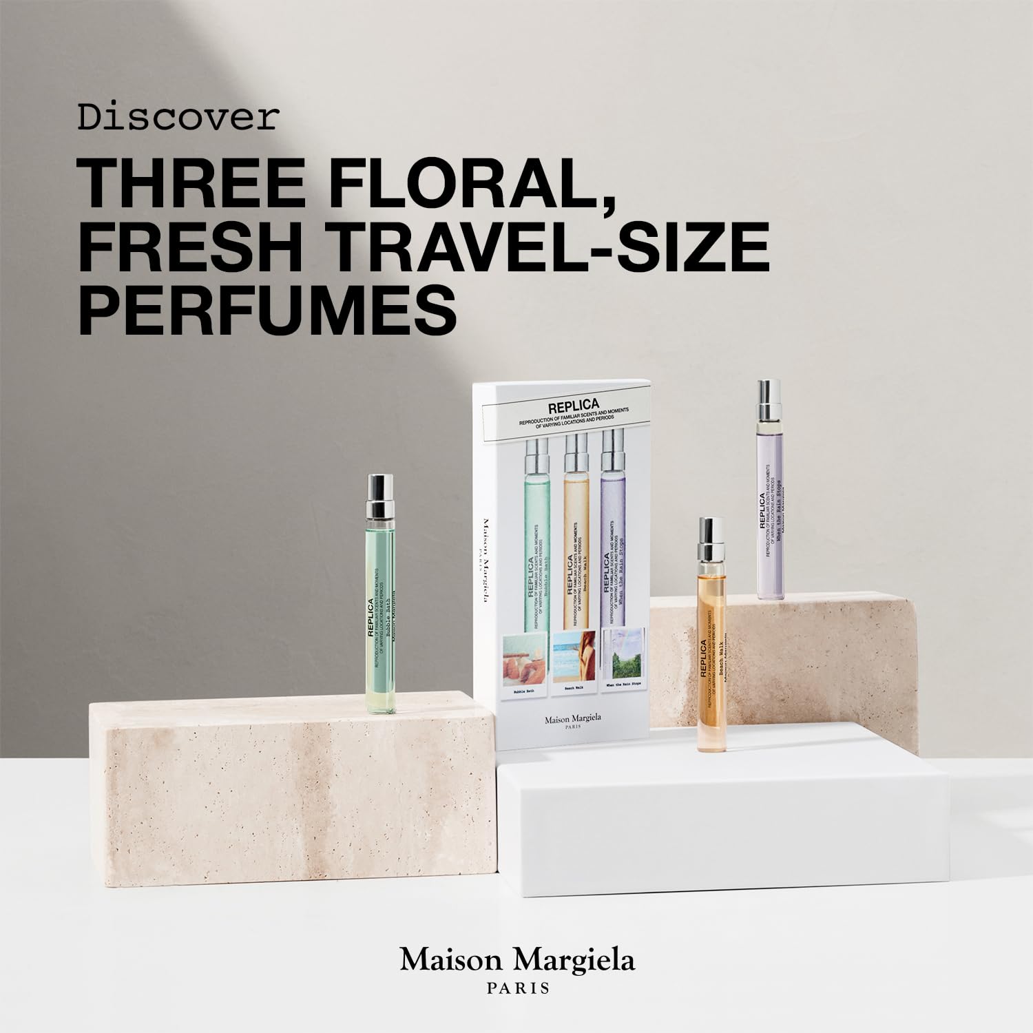 Maison Margiela Replica travel set packaging highlights compact, portable fragrance options.