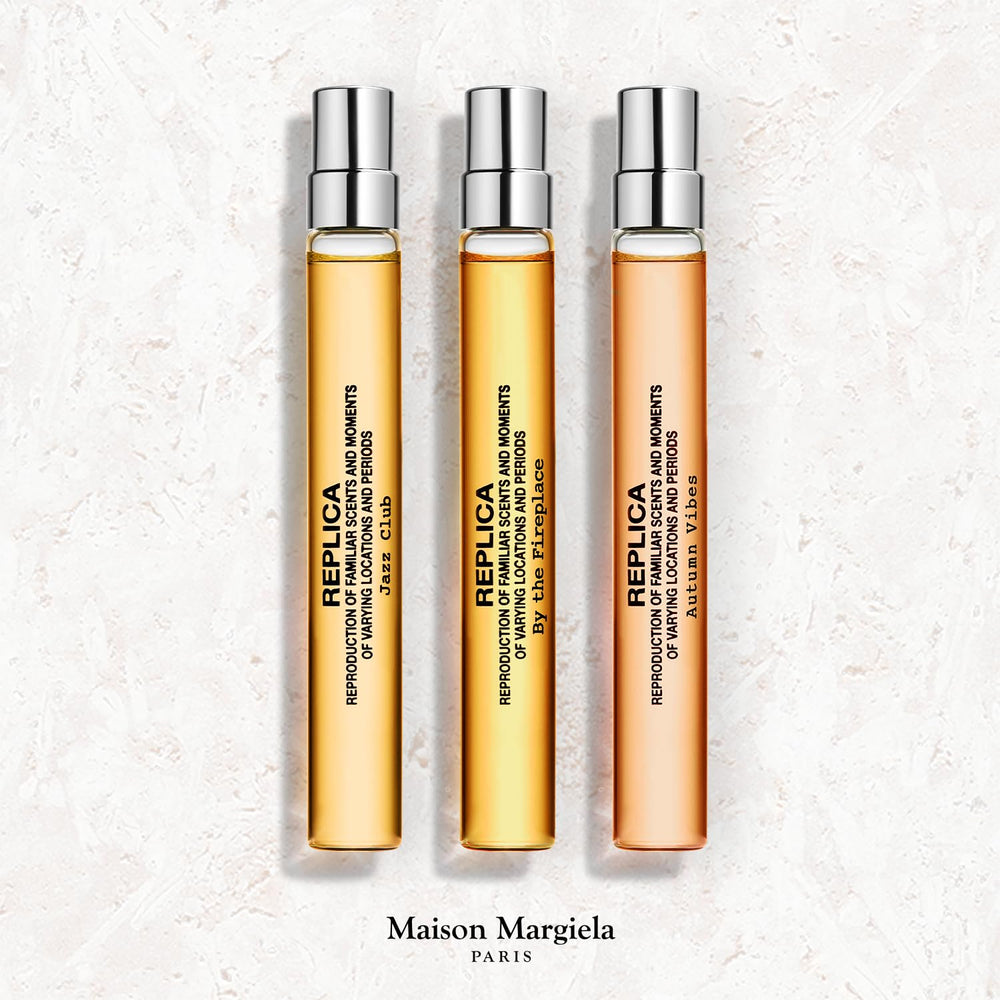 Maison Margiela Replica By the Fireplace bottle shot highlighting cozy warmth and lingering sillage