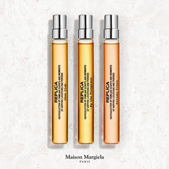 Maison Margiela Replica By the Fireplace bottle shot highlighting cozy warmth and lingering sillage