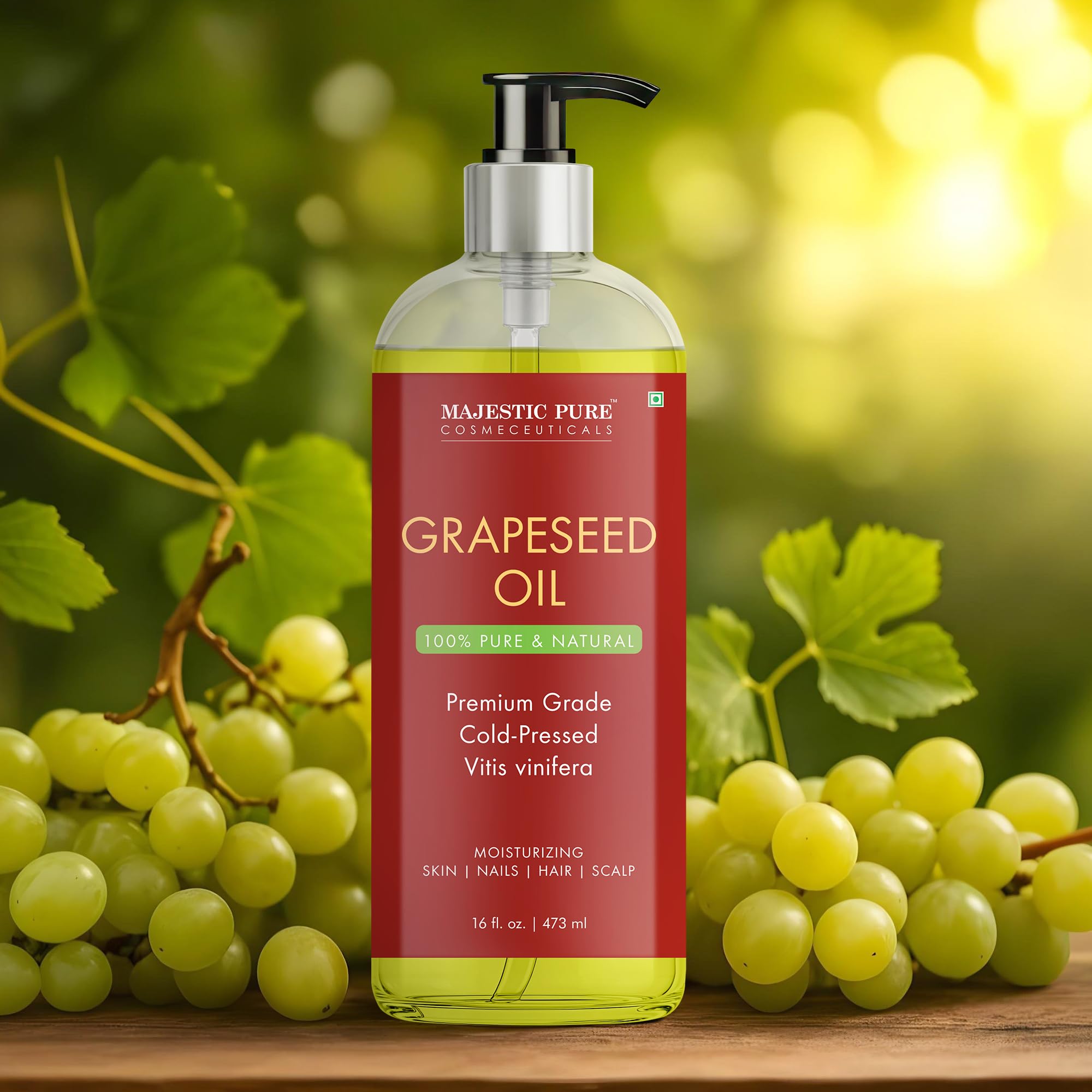 Majestic Pure grapeseed oil drops closeup for lightweight moisturization and soft skin.