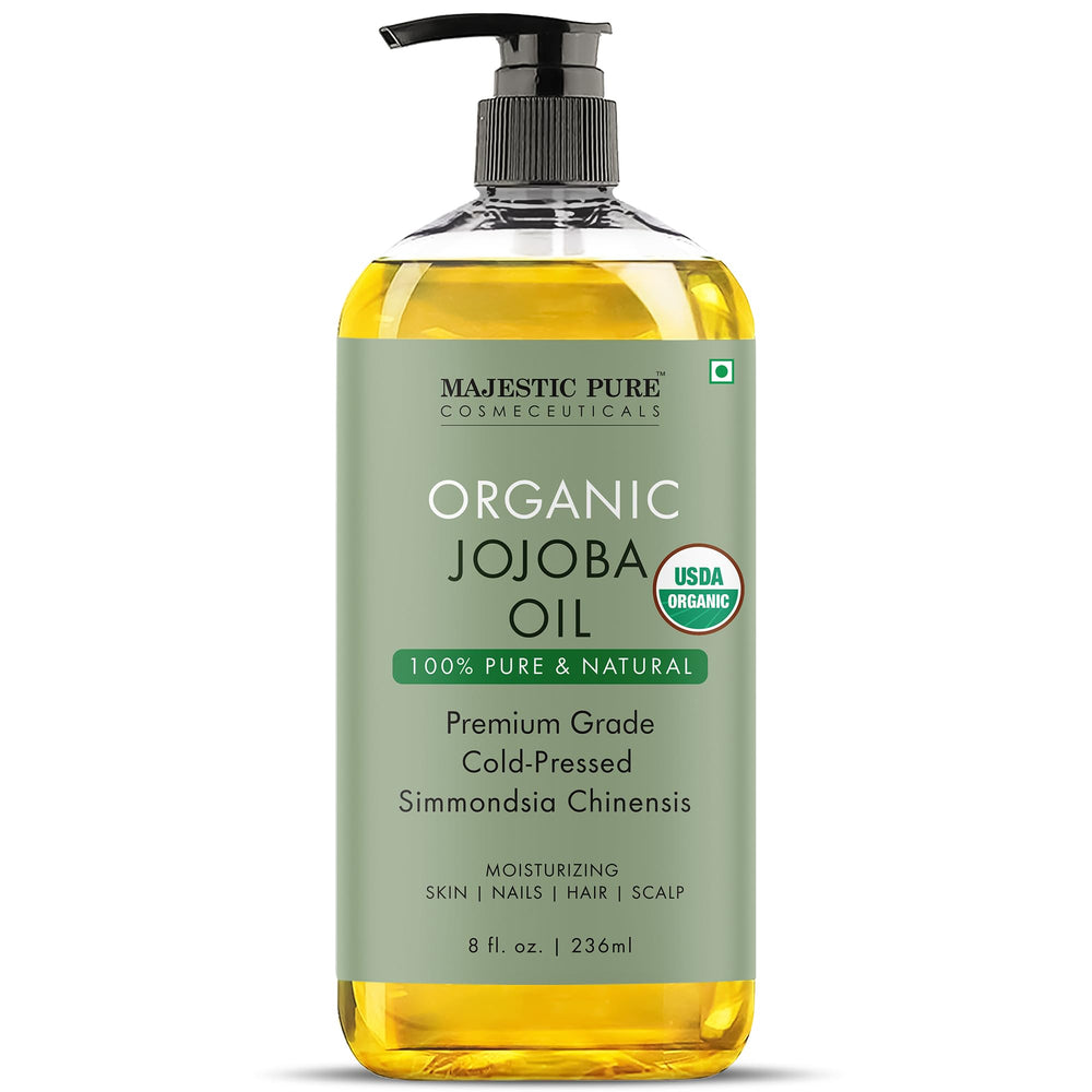Majestic Pure Jojoba Oil bottle pour demonstrates fast absorption for soft, radiant skin.