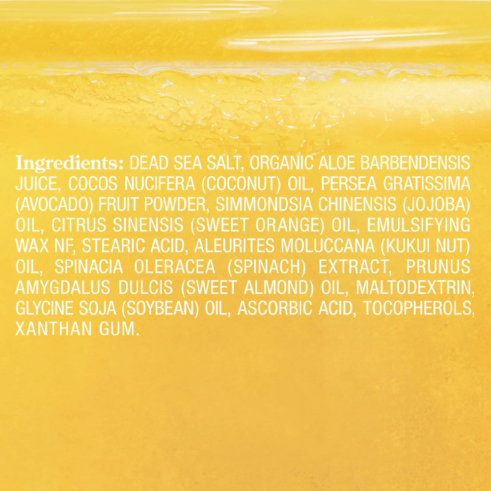 Majestic Pure Sweet Orange Body Scrub shows Dead Sea Salt crystals for mineral-rich exfoliation