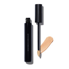 MAKE Beauty Skin Mimetic Concealer tube close-up showing buildable coverage.