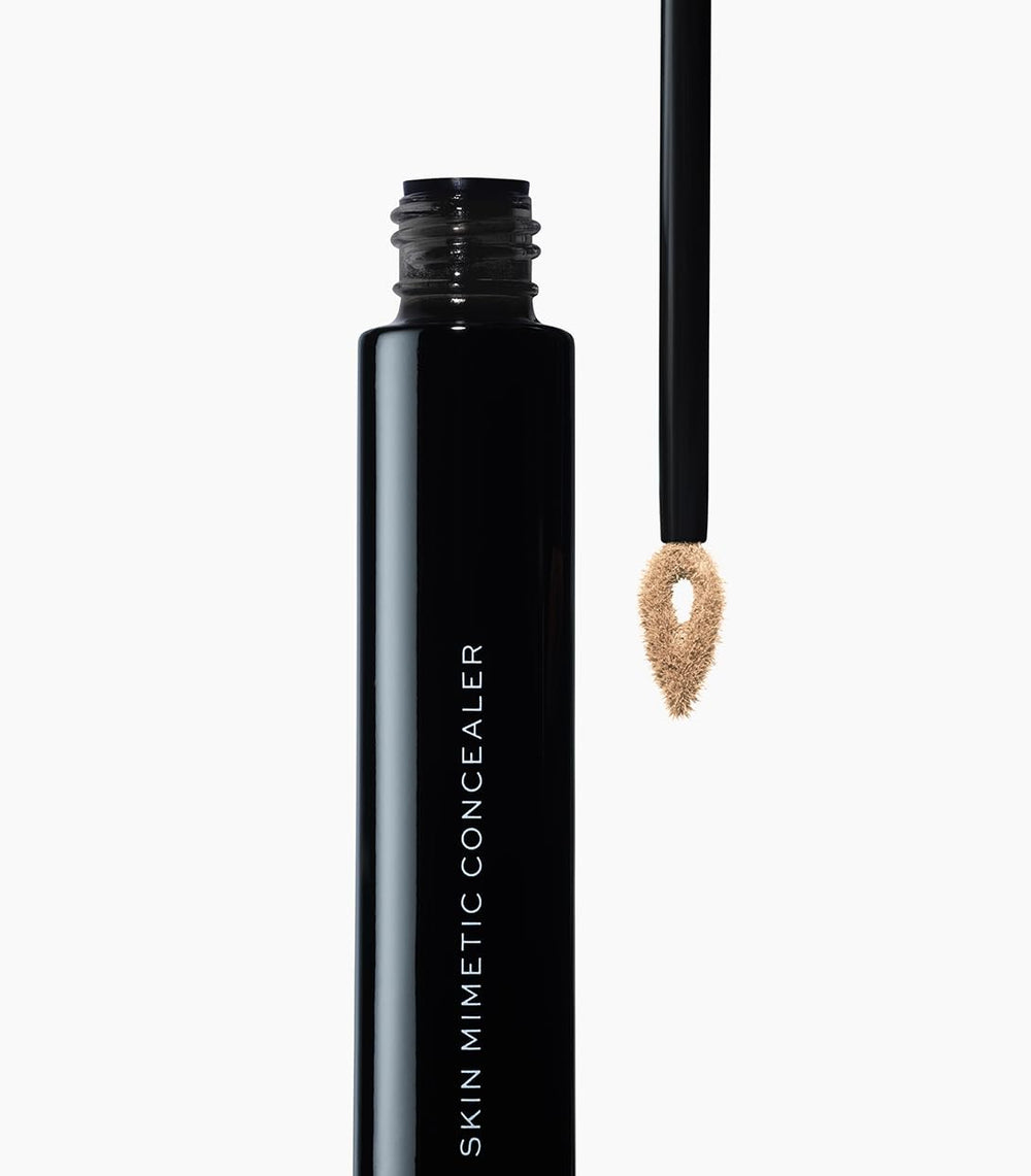 MAKE Beauty Skin Mimetic Concealer under-eye swatch brightens the darkness.