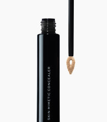 MAKE Beauty Skin Mimetic Concealer under-eye swatch brightens the darkness.