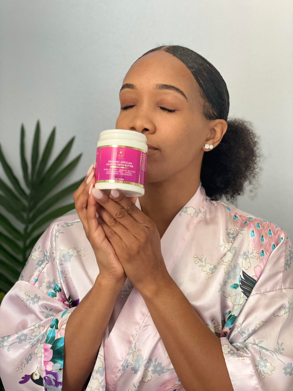 Makof Beauty Chebe Butter on hair in routine shot suggests leave-in moisture.