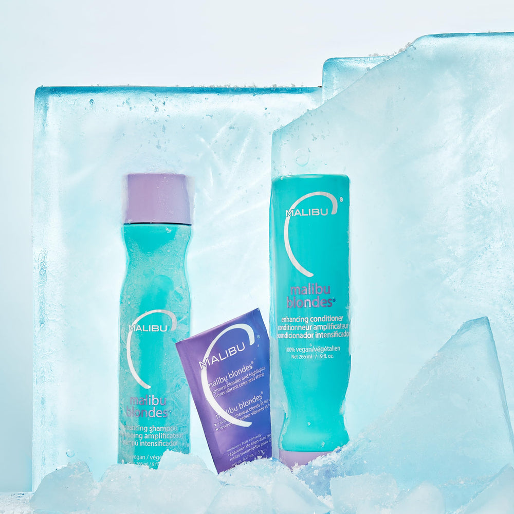 Malibu C Blondes Purple Conditioner application shows color-safe detangling.