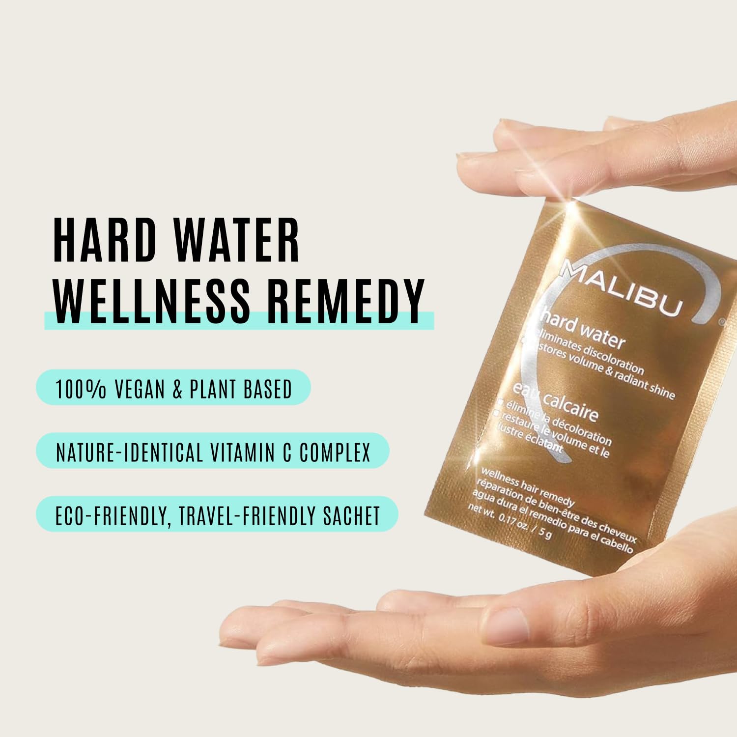 Malibu C Hard Water Remedy mask being massaged through hair for hydration.