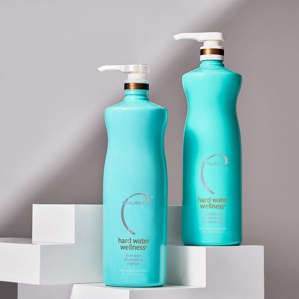 Malibu C conditioner jar demonstrates nourishing plant-based formula for strong, manageable hair.