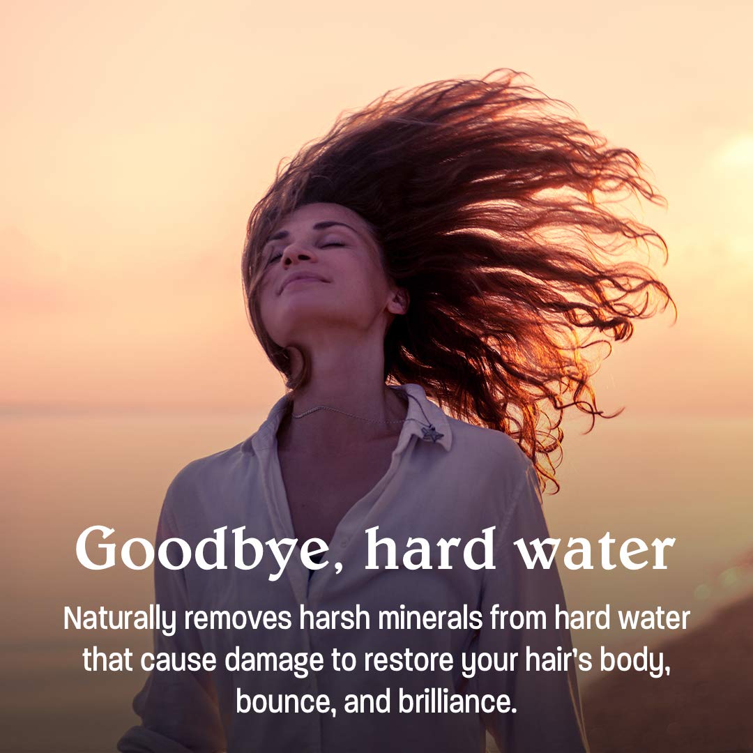 Malibu C Hard Water Wellness Shampoo application on hair demonstrates cleansing action.